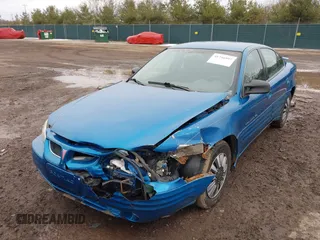 1999 Pontiac Grand Am SE2 with VIN 1G2NE52T2XM904094, listed as a IAAI auction lot 41746997 with 0 mi miles. Bid and sale history available at carsss.com. Image 2.