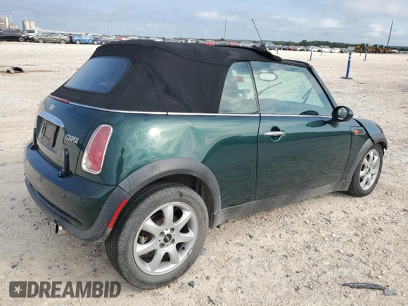 2007 MINI Convertible with VIN WMWRF33567TF66784, listed as a Copart auction lot 71571744 with 115,008 mi miles and Salvage Title. Bid and sale history available at DreamBid. Image 3.
