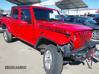 2022 Jeep Gladiator Willys Sport z VIN 1C6HJTAG0NL180848, wystawiony jako IAAI lot #41778129 z przebiegiem Nie podano mil oraz . Historia ofert i sprzedaży dostępna na DreamBid. Obrazek 1.