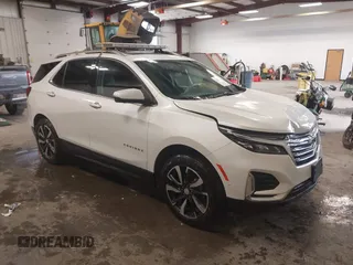 2022 Chevrolet Equinox Premier z VIN 3GNAXXEV6NS197373, wystawiony jako IAAI lot #42277394 z przebiegiem 95 665 mil mil oraz . Historia ofert i sprzedaży dostępna na DreamBid. Obrazek 1.