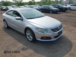 2010 Volkswagen CC Luxury z VIN WVWHP7AN0AE534184, wystawiony jako IAAI lot #42448527 z przebiegiem 99 787 mil mil oraz . Historia ofert i sprzedaży dostępna na DreamBid. Obrazek 1.