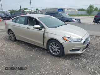 2017 Ford Fusion SE z VIN 3FA6P0H76HR296456, wystawiony jako IAAI lot #42350100 z przebiegiem 184 621 mil mil oraz . Historia ofert i sprzedaży dostępna na DreamBid. Obrazek 1.