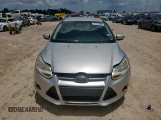 2012 Ford Focus SE with VIN 1FAHP3F29CL287498, listed as a Copart auction lot 61476855 with 139,801 mi miles and Salvage title. Bid and sale history available at DreamBid. Image 5.