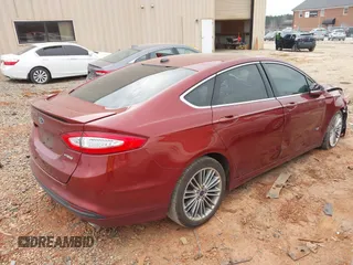 2014 Ford Fusion SE Hybrid with VIN 3FA6P0LU3ER289277, listed as a IAAI auction lot 41686380 with 178,339 mi miles. Bid and sale history available at carsss.com. Image 4.