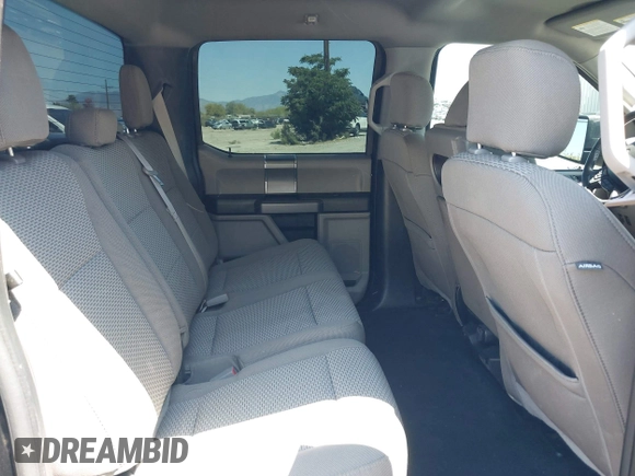 2018 Ford F-150 XL with VIN 1FTEW1C50JKF28600, listed as a IAAI auction lot 42081191 with 105,636 mi miles and . Bid and sale history available at DreamBid. Image 8.