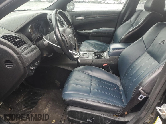 2015 Chrysler 300 S with VIN 2C3CCAGG2FH793081, listed as a Copart auction lot 56705225 with 110,450 mi miles and Salvage title. Bid and sale history available at DreamBid. Image 7.