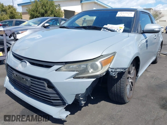 2014 Scion tC with VIN JTKJF5C71E3077886, listed as a IAAI auction lot 41939128 with 138,845 mi miles. Bid and sale history available at carsss.com. Image 6.