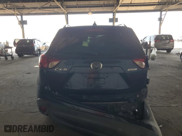 2016 Mazda CX-5 Touring with VIN JM3KE2CY7G0653854, listed as a Copart auction lot 74825564 with 139,193 mi miles and Salvage Title. Bid and sale history available at DreamBid. Image 6.