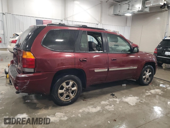 2003 GMC Envoy SLT with VIN 1GKDT13S532241707, listed as a Copart auction lot 86694024 with 185,480 mi miles and Clean Title. Bid and sale history available at carsss.com. Image 3.