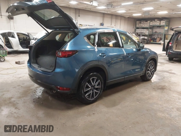 2018 Mazda CX-5 S Premium with VIN JM3KFBDMXJ1376045, listed as a IAAI auction lot 41813968 with 90,378 mi miles and . Bid and sale history available at DreamBid. Image 4.