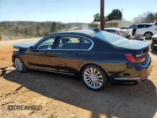 2020 BMW 7 Series 740i with VIN WBA7T2C07LCD79725, listed as a Copart auction lot 48498255 with 57,580 mi miles and Salvage title. Bid and sale history available at DreamBid. Image 2.