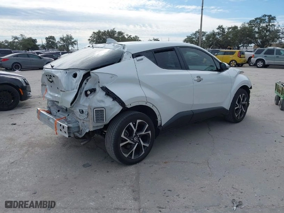 2022 Toyota C-HR XLE with VIN NMTKHMBX4NR147265, listed as a IAAI auction lot 41291034 with 22,403 mi miles. Bid and sale history available at carsss.com. Image 4.