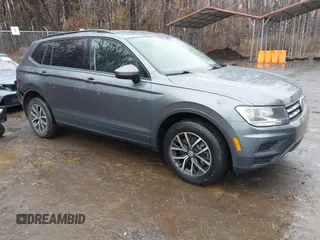 2021 Volkswagen Tiguan S with VIN 3VV0B7AX3MM026708, listed as a IAAI auction lot 41527399 with 80,061 mi miles. Bid and sale history available at carsss.com. Image 1.