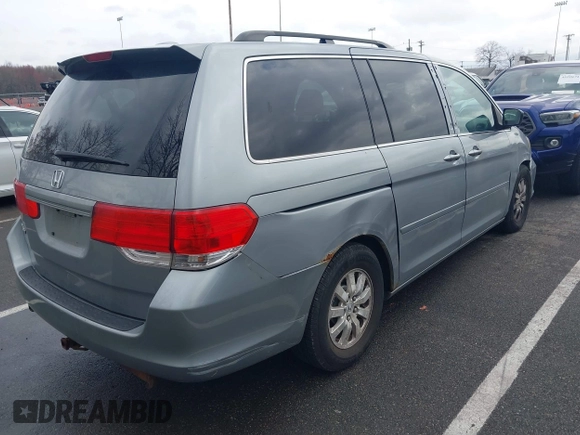 2008 Honda Odyssey EX-L with VIN 5FNRL38718B115950, listed as a IAAI auction lot 41957715 with 226,033 mi miles and . Bid and sale history available at DreamBid. Image 4.
