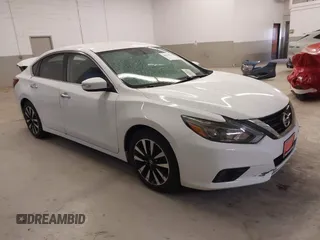 2018 Nissan Altima SR z VIN 1N4AL3AP1JC181544, wystawiony jako IAAI lot #40940704 z przebiegiem 68 731 mil mil oraz . Historia ofert i sprzedaży dostępna na DreamBid. Obrazek 1.