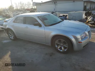 2005 Chrysler 300 with VIN 2C3JA43R65H528703, listed as a Copart auction lot 42057285 with 159,316 mi miles and Salvage Title. Bid and sale history available at carsss.com. Image 4.