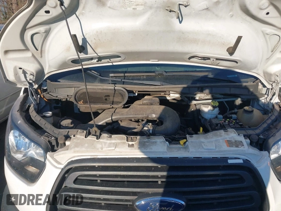 2019 Ford Transit with VIN 1FTYE1CM6KKA74930, listed as a IAAI auction lot 41020843 with 104,218 mi miles and . Bid and sale history available at DreamBid. Image 10.