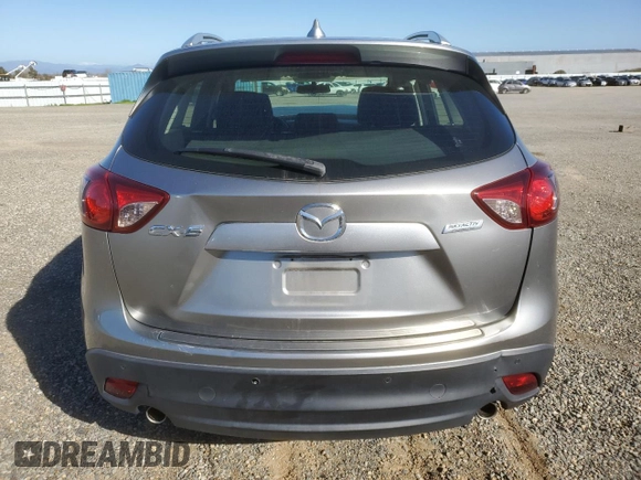 2014 Mazda CX-5 Sport with VIN JM3KE2BE1E0350718, listed as a Copart auction lot 46370205 with 98,065 mi miles and Salvage title. Bid and sale history available at DreamBid. Image 6.