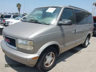 2001 GMC Safari z VIN 1GKDM19W21B502635, wystawiony jako IAAI lot #42368626 z przebiegiem 150 336 mil mil oraz . Historia ofert i sprzedaży dostępna na DreamBid. Obrazek 2.