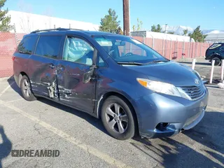 2015 Toyota Sienna LE AAS with VIN 5TDKK3DC6FS625436, listed as a IAAI auction lot 41823140 with 160,416 mi miles and . Bid and sale history available at DreamBid. Image 1.