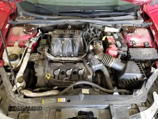 2012 Ford Fusion SEL z VIN 3FAHP0JG0CR265666, wystawiony jako Copart lot #62860355 z przebiegiem 126 812 mil mil oraz Szkoda całkowita • Salvage title. Historia ofert i sprzedaży dostępna na DreamBid. Obrazek 11.
