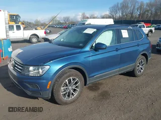2020 Volkswagen Tiguan SE with VIN 3VV2B7AX2LM017277, listed as a IAAI auction lot 42075052 with 72,248 mi miles and . Bid and sale history available at DreamBid. Image 2.