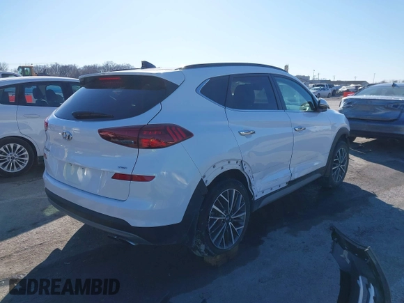 2019 Hyundai Tucson Ultimate with VIN KM8J3CAL2KU903389, listed as a IAAI auction lot 41421264 with 73,326 mi miles. Bid and sale history available at carsss.com. Image 4.