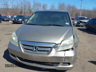 2006 Honda Odyssey EX-L z VIN 5FNRL38736B069969, wystawiony jako IAAI lot #41695311 z przebiegiem 196 218 mil mil oraz . Historia ofert i sprzedaży dostępna na DreamBid. Obrazek 17.