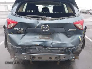 2015 Mazda CX-5 Sport with VIN JM3KE4BY0F0507727, listed as a IAAI auction lot 41249151 with 95,343 mi miles. Bid and sale history available at carsss.com. Image 6.