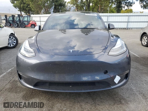 2021 Tesla Model Y Long Range with VIN 5YJYGDEE6MF200883, listed as a Copart auction lot 51707405 with 59,820 mi miles and Salvage Title. Bid and sale history available at DreamBid. Image 5.