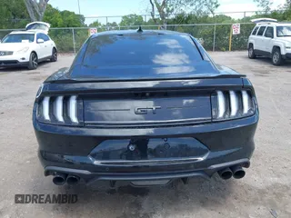 2021 Ford Mustang GT z VIN 1FA6P8CF9M5101993, wystawiony jako IAAI lot #42152731 z przebiegiem 25 699 mil mil oraz . Historia ofert i sprzedaży dostępna na DreamBid. Obrazek 16.