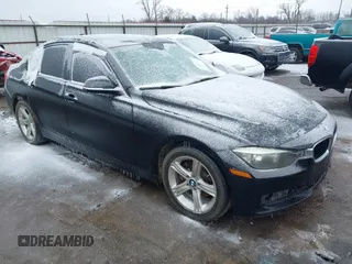 2012 BMW 3 Series 328i with VIN WBA3A5C56CF348558, listed as a IAAI auction lot 41541776 with 138,245 mi miles. Bid and sale history available at carsss.com. Image 1.