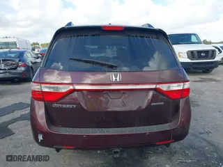 2011 Honda Odyssey Touring with VIN 5FNRL5H97BB008759, listed as a IAAI auction lot 41567010 with 215,709 mi miles. Bid and sale history available at carsss.com. Image 16.