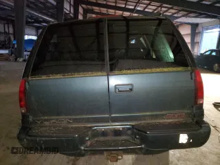 1999 GMC Denali z VIN 1GKEK13R5XR918465, wystawiony jako Copart lot #83269184 z przebiegiem Nie podano mil oraz Nie do naprawy. Historia ofert i sprzedaży dostępna na DreamBid. Obrazek 6.