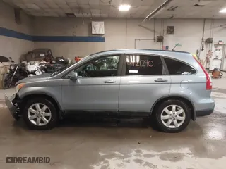 2009 Honda CR-V EX-L with VIN 5J6RE48739L037292, listed as a IAAI auction lot 41121290 with 150,597 mi miles. Bid and sale history available at carsss.com. Image 14.