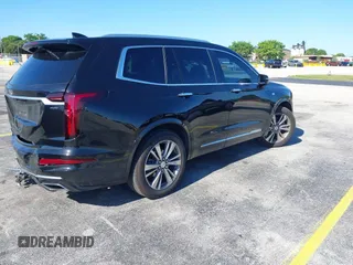 2020 Cadillac XT6 FWD Premium Luxury with VIN 1GYKPCRS7LZ211197, listed as a IAAI auction lot 42231424 with 57,351 mi miles and . Bid and sale history available at DreamBid. Image 4.