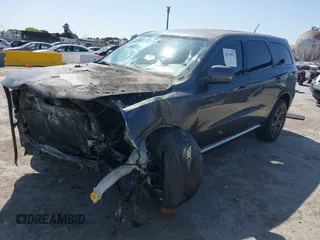 2013 Dodge Durango SXT with VIN 1C4RDJAG5DC697005, listed as a IAAI auction lot 42396872 with 115,046 mi miles and . Bid and sale history available at DreamBid. Image 2.