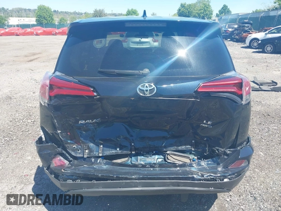 2017 Toyota RAV4 LE with VIN JTMBFREV8HJ168975, listed as a IAAI auction lot 42139354 with 91,394 mi miles and . Bid and sale history available at DreamBid. Image 16.