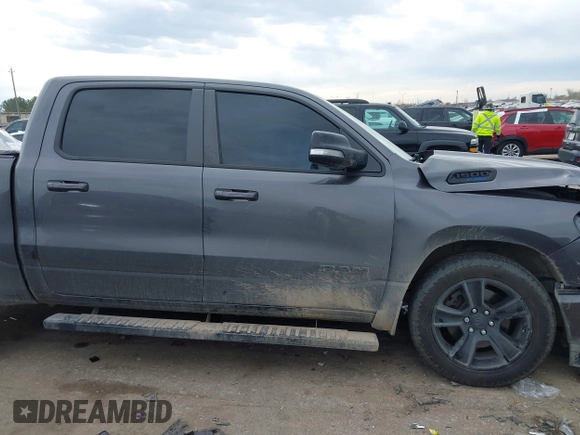 2021 Ram 1500 Lone Star with VIN 1C6RREFT2MN746770, listed as a IAAI auction lot 41360600 with 76,998 mi miles and . Bid and sale history available at DreamBid. Image 14.