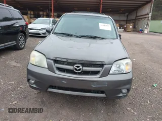 2006 Mazda Tribute S with VIN 4F2YZ04196KM12510, listed as a IAAI auction lot 41382627 with 242,650 mi miles and . Bid and sale history available at DreamBid. Image 6.