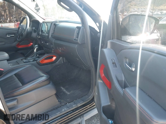 2023 Nissan Frontier Pro-X with VIN 1N6ED1EJ6PN619651, listed as a IAAI auction lot 41838415 with 69,819 mi miles and . Bid and sale history available at DreamBid. Image 5.