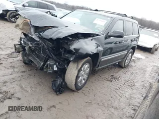 2009 Jeep Grand Cherokee Limited with VIN 1J8HR58T89C541970, listed as a IAAI auction lot 41189623 with 74,161 mi miles. Bid and sale history available at carsss.com. Image 2.