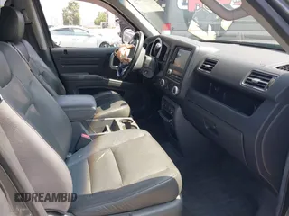 2007 Honda Ridgeline RTL with VIN 2HJYK16547H502601, listed as a IAAI auction lot 42484634 with 197,253 mi miles and . Bid and sale history available at DreamBid. Image 5.