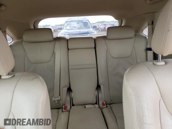 2010 Lexus RX 450h with VIN JTJBC1BA9A2022402, listed as a Copart auction lot 52674284 with 221,661 mi miles and Salvage Title. Bid and sale history available at DreamBid. Image 10.