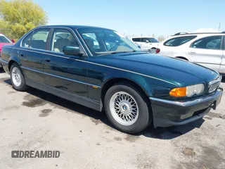 1999 BMW 7 Series with VIN WBAGG8335XDN73992, listed as a IAAI auction lot 41958311 with 146,882 mi miles and . Bid and sale history available at DreamBid. Image 1.
