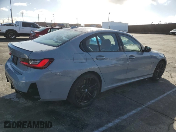2023 BMW 3 Series 330e with VIN 3MW39FF07P8D26890, listed as a Copart auction lot 45203065 with 21,679 mi miles and Salvage Title. Bid and sale history available at carsss.com. Image 3.
