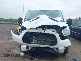 2019 Ford Transit with VIN 1FTYR1ZM3KKB50213, listed as a IAAI auction lot 42223430 with 75,131 mi miles and . Bid and sale history available at DreamBid. Image 13.