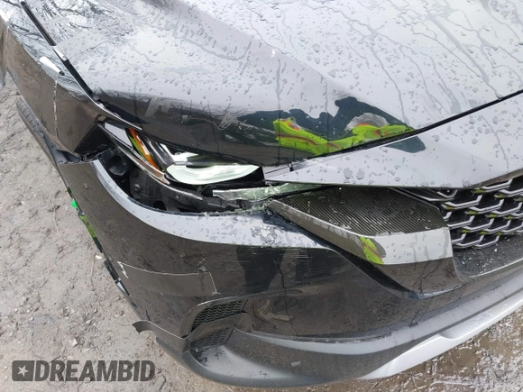2024 Mazda CX-50 Premium z VIN 7MMVABDYXRN180263, wystawiony jako IAAI lot #41738791 z przebiegiem 9 688 mil mil oraz . Historia ofert i sprzedaży dostępna na DreamBid. Obrazek 21.