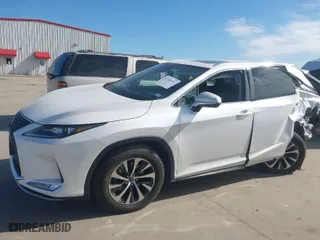 2022 Lexus RX with VIN 2T2HZMAA9NC234752, listed as a IAAI auction lot 41266112 with 42,853 mi miles. Bid and sale history available at carsss.com. Image 15.