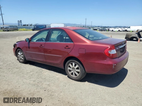 2003 Toyota Camry LE z VIN 4T1BF30K23U056007, wystawiony jako Copart lot #55187435 z przebiegiem 233 976 mil mil oraz Czysty tytuł • Clean title. Historia ofert i sprzedaży dostępna na DreamBid. Obrazek 2.